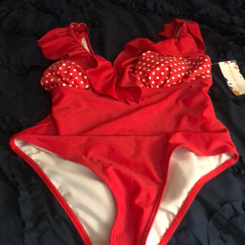 Brand new one piece red. Ruffle